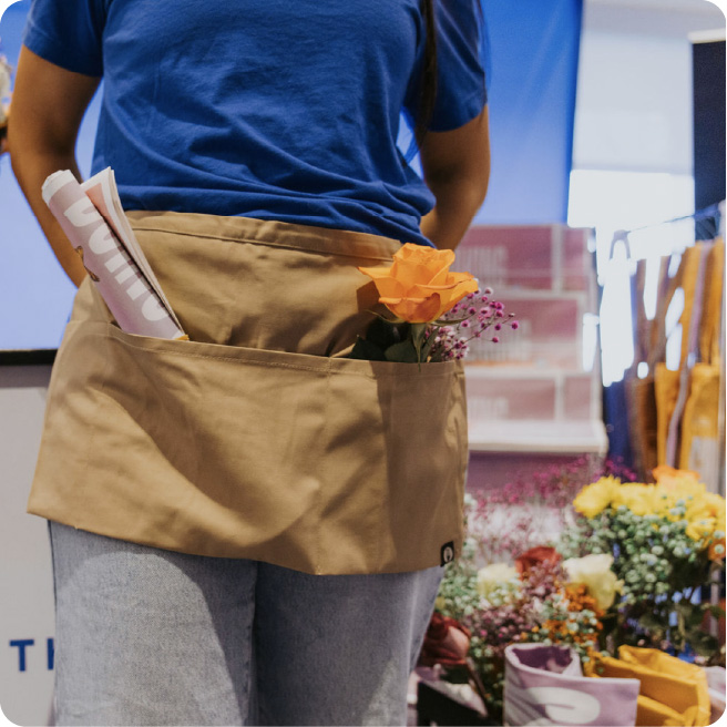 An apron with flowers in it