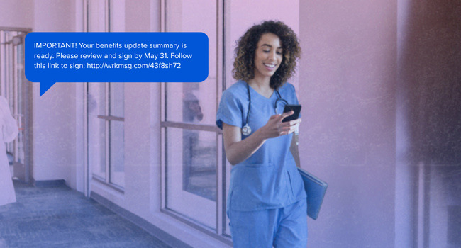 A nurse on shift getting an SMS from HR about benefits.